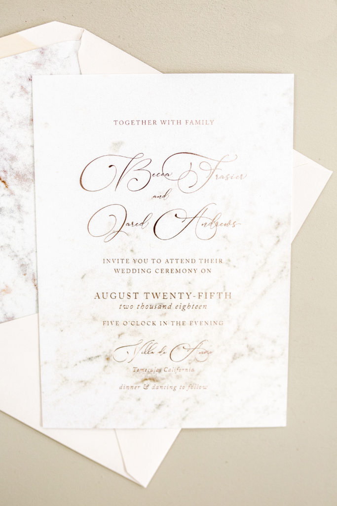 gold foiled text wedding invitation