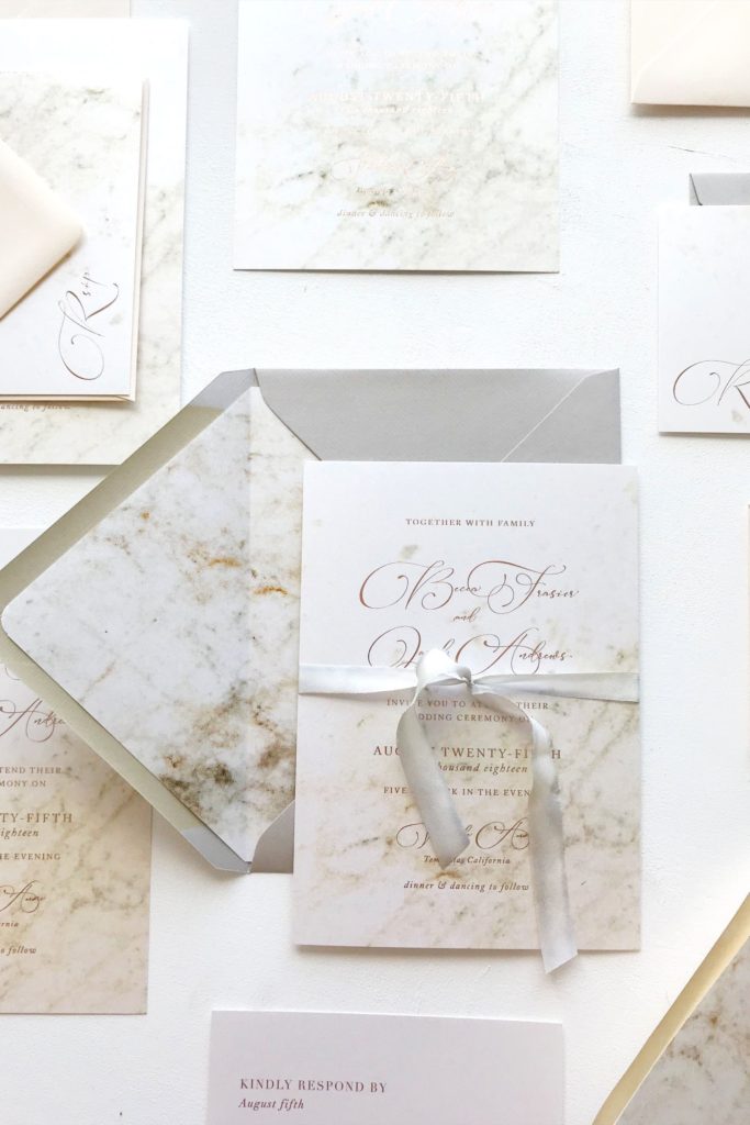 Rose gold foiled wedding invitations